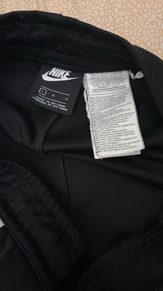 Pantaloni tuta Nike neri con zip