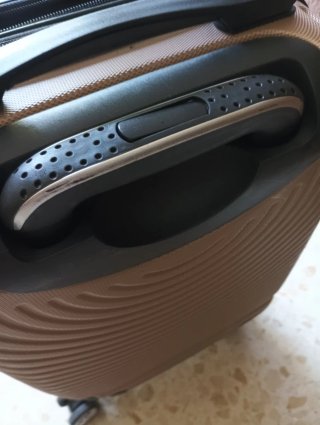 Maleta de viaje marrón y negra