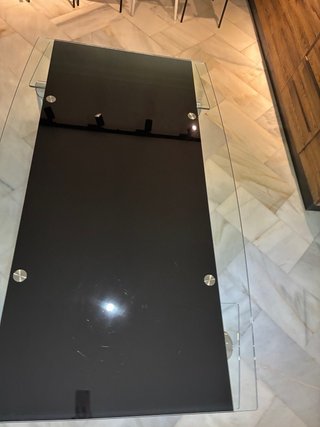 Tavolo da centro in vetro nero e acciaio