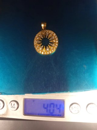 Colgante oro 18k. y circonitas