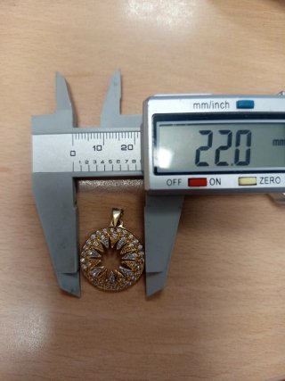 Colgante oro 18k. y circonitas