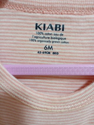 Body bebé rosa a rayas Kiabi