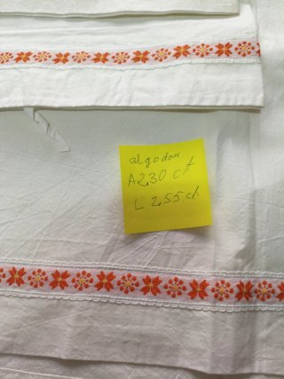 Sábana de algodón con bordado naranja