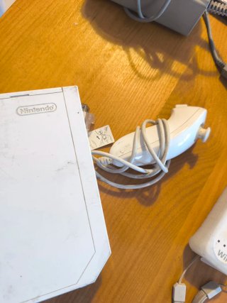 Consola Wii con mandos y juegos