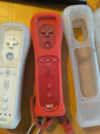 Consola Wii con mandos y juegos