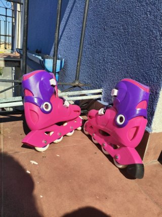 Patines en línea rosas y morados para niños