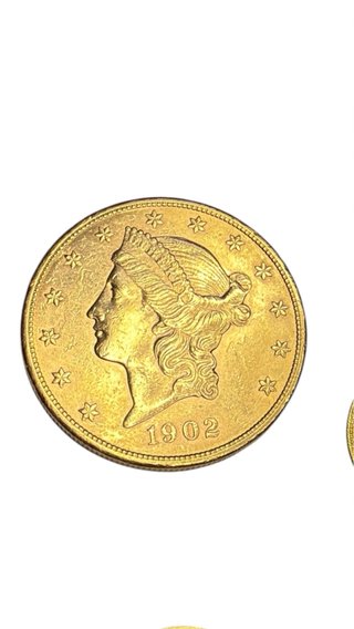 Monedas de oro al peso
