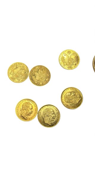 Monedas de oro al peso