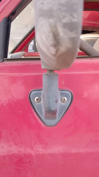 Retrovisor Nissan Vanette izquierdo