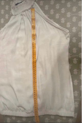Top smanicato bianco