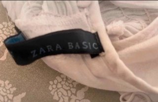 Top smanicato bianco