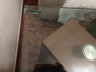 Mesa de cristal y madera