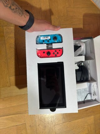 Nintendo switch + Zelda + juegos y accesorios.