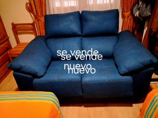 Sofá azul reclinable sin usar