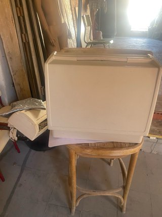 Máquina de coser Singer vintage naranja