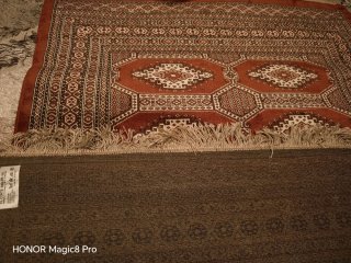 Alfombra estilo persa marrón y roja