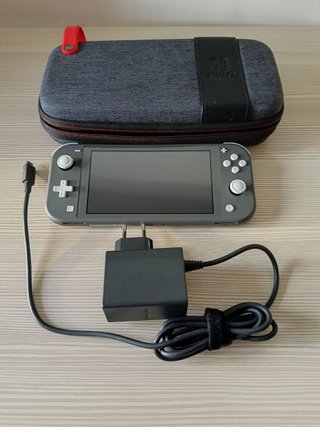 Nintendo Switch Lite + Juegos (Zelda,etc) + Funda