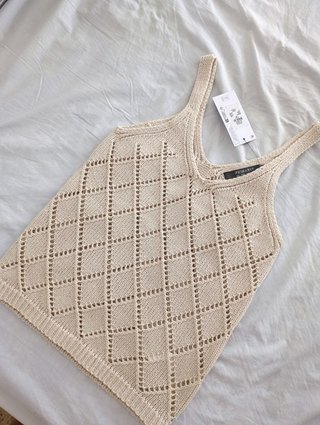 Top sin mangas. De punto calado o crochet. Nuevo s