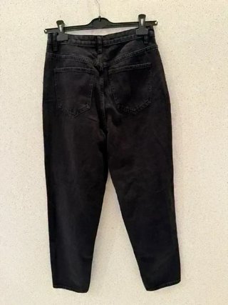 Jeans neri strappati