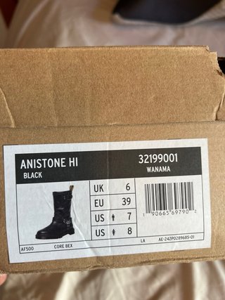 Botas Dr. Martens con plataforma y hebilla