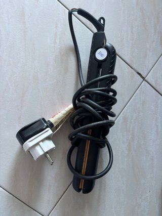 Plancha de pelo negra