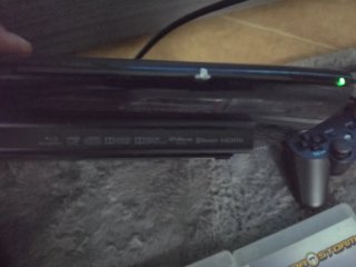 PS3 Super Slim 12GB + 2 Mandos + Trilogía MotorSto