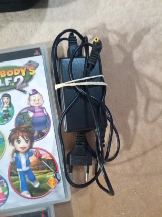Consola PSP + 6 Juegos. Modelo 1004