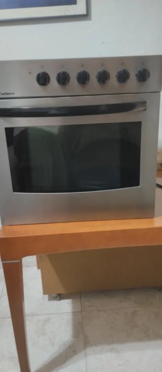 Vitrocerámica con horno y campana