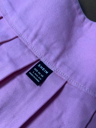 Falda SHEIN rosa plisada talla L (40/42)
