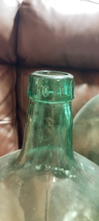 4 Damajuanas de cristal verde oscuro
