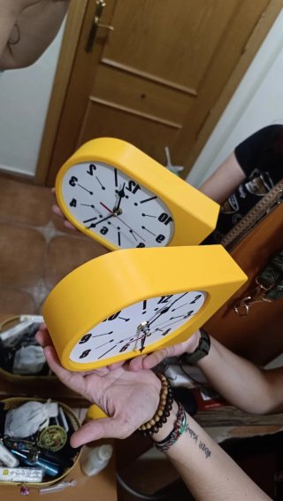 Reloj doble cara de pared