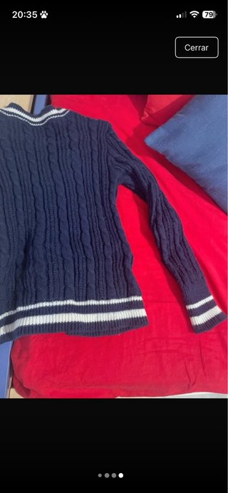 Jersey azul con cuello V