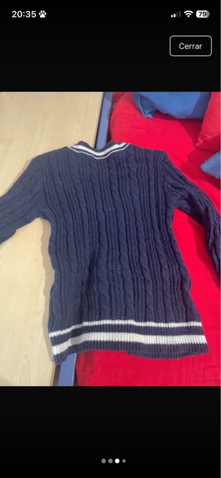 Jersey azul con cuello V