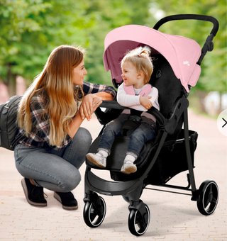 Carrito de bebé rosa