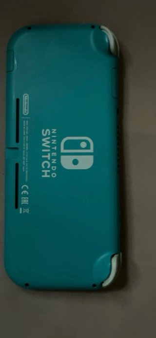 Nintendo Switch Lite Verde + 2 Juegos