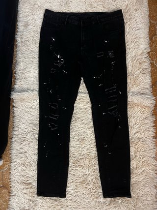 Jeans neri uomo con strappi