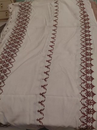 Colcha vintage con bordado y flecos