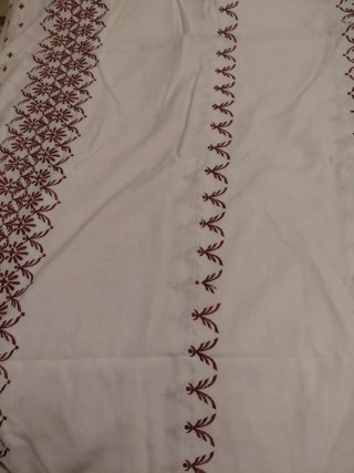 Colcha vintage con bordado y flecos