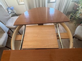 Mesa de comedor extensible de madera