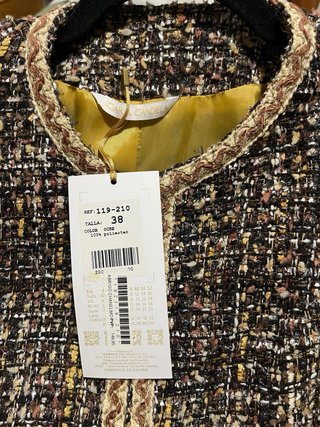 Chaqueta tipo Chanel elegante