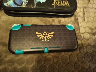 Nintendo Switch Lite + 4 Juegos