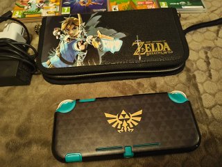 Nintendo Switch Lite + 4 Juegos