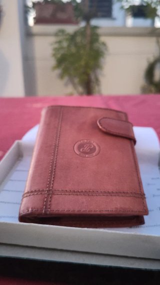Cartera de piel artesanal marroquinería