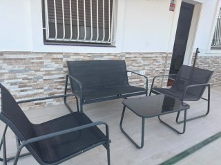 Mesa y sillas de terraza metálicas