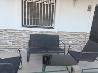 Mesa y sillas de terraza metálicas