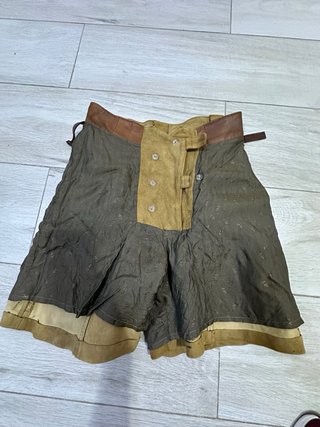 Falda short de piel marrón mirar las medidas