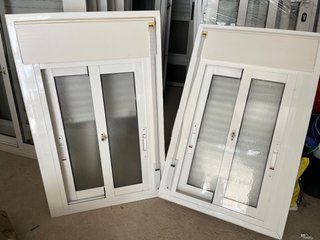 Ventana corredera con persiana