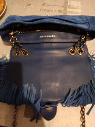 Bolso azul de ante con flecos