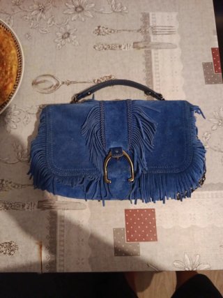 Bolso azul de ante con flecos