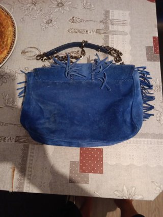 Bolso azul de ante con flecos
